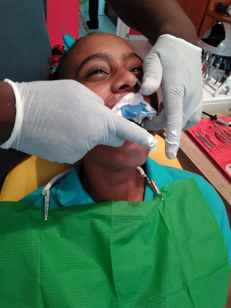 Patient having a clear aligner fitted during an Invisalign appointment